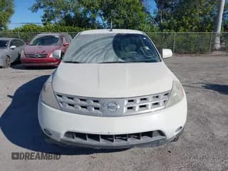 ✅ 2004 Nissan Murano SE • VIN: JN8AZ08TX4W212162 • Lot: 43699675. Wystawiony na IAAI z przebiegiem 199 410 mil. Bezpłatny archiwum sprzedaży aukcyjnych z USA i szczegółowy raport historii pojazdu na DreamBid. Zdjęcie 6.