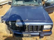 ✅ 1997 Jeep Cherokee Country • VIN: 1J4FJ78S1VL603836 • Lot: 93272635. Listed on Copart with 170,878 mi. Free auction sales archive from the USA and detailed vehicle history report at DreamBid. Image 12.