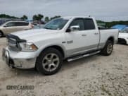 ✅ 2017 Ram 1500 Laramie • VIN: 1C6RR7JT3HS566059 • Lot: 62672125. Listed on Copart with 84,382 mi. Free auction sales archive from the USA and detailed vehicle history report at DreamBid. Image 1.