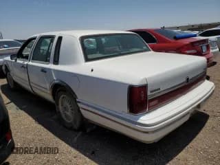 ✅ 1994 Lincoln Town Car Signature • VIN: 1LNLM82W3RY633555 • Lot: 81430533. Listed on Copart with 202,350 mi. Free auction sales archive from the USA and detailed vehicle history report at DreamBid. Image 2.