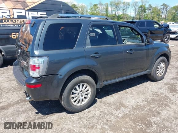 ✅ 2010 Mercury Mariner Premier • VIN: 4M2CN9HG8AKJ18091 • Lot: 42215475. Listed on IAAI with 97,332 mi. Free auction sales archive from the USA and detailed vehicle history report at DreamBid. Image 4.