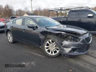 ✅ 2015 Mazda 6 i Touring • VIN: JM1GJ1V50F1195753 • Lot: 43712882. Listed on IAAI with 172,973 mi. Free auction sales archive from the USA and detailed vehicle history report at DreamBid. Image 1.