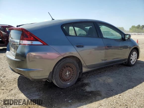 ✅ 2012 Honda Insight • VIN: JHMZE2H34CS003929 • Lot: 52707885. Listed on Copart with 131,596 mi. Free auction sales archive from the USA and detailed vehicle history report at DreamBid. Image 3.