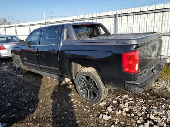 ✅ 2017 Chevrolet Silverado 1500 High Country • VIN: 3GCUKTEC5HG438097 • Лот: 92274235. Опубликован ранее на Copart с пробегом Не указан. Бесплатный доступ к архиву аукционных продаж из США и подробный отчёт об истории автомобиля на DreamBid. Изображение 2.