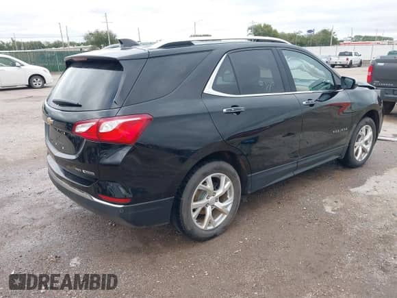 2018 Chevrolet Equinox Premier с VIN 2GNAXVEV8J6262687, выставлен на аукционе IAAI как лот 43275439 с пробегом 159 141 миль миль и . История ставок и продаж доступна на DreamBid. Изображение 4.