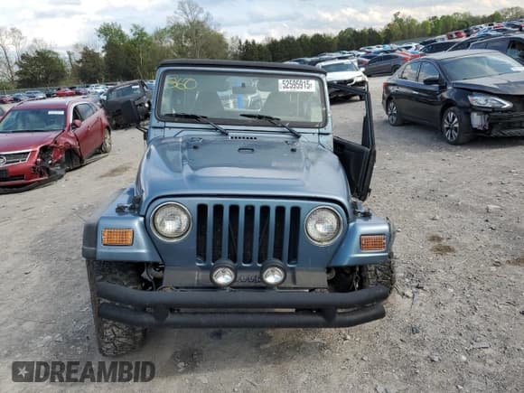 ✅ 1999 Jeep Wrangler Sport • VIN: 1J4FY19S5XP454396 • Лот: 52595915. Опубликован ранее на Copart с пробегом 265 004 миль. Бесплатный доступ к архиву аукционных продаж из США и подробный отчёт об истории автомобиля на DreamBid. Изображение 5.