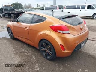 ✅ 2015 Hyundai Veloster RE:FLEX • VIN: KMHTC6AD8FU238345 • Lot: 41549377. Wystawiony na IAAI z przebiegiem 117 240 mil. Bezpłatny archiwum sprzedaży aukcyjnych z USA i szczegółowy raport historii pojazdu na DreamBid. Zdjęcie 3.