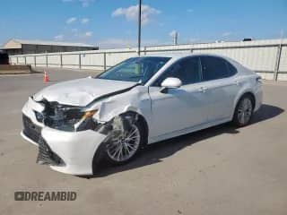 2020 Toyota Camry Hybrid XLE with VIN 4T1F31AK5LU523112, listed as a Copart auction lot 81681785 with 35,773 mi miles and Salvage title. Bid and sale history available at DreamBid. Image 1.