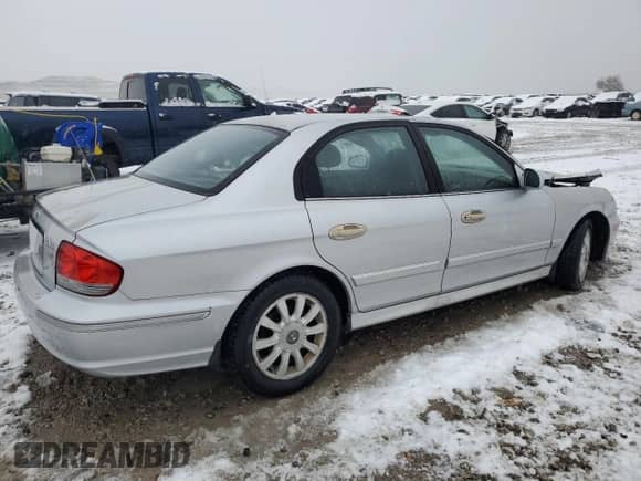 2003 Hyundai Sonata GLS с VIN KMHWF35H33A824982, выставлен на аукционе Copart как лот 84104904 с пробегом Не указан миль и Списание • Salvage title. История ставок и продаж доступна на DreamBid. Изображение 3.