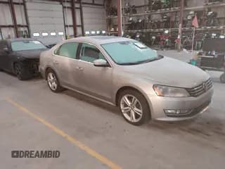 ✅ 2014 Volkswagen Passat SEL Premium • VIN: 1VWCN7A35EC099322 • Lot: 43729054. Listed on IAAI with 127,449 mi. Free auction sales archive from the USA and detailed vehicle history report at DreamBid. Image 1.