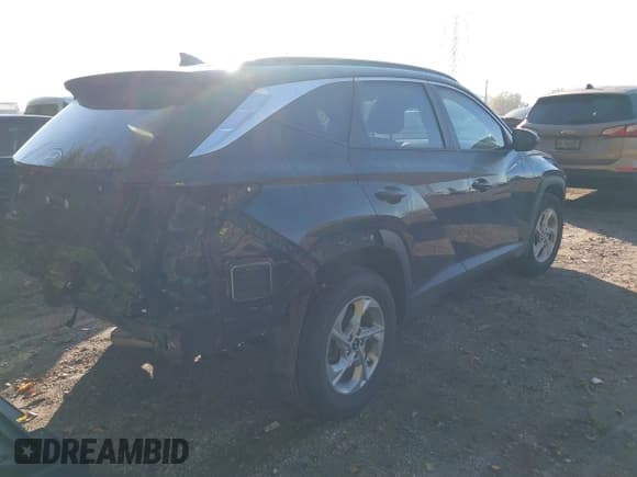 ✅ 2022 Hyundai Tucson SEL • VIN: 5NMJBCAE0NH137845 • Lot: 43319065. Listed on IAAI with 63,165 mi. Free auction sales archive from the USA and detailed vehicle history report at DreamBid. Image 4.