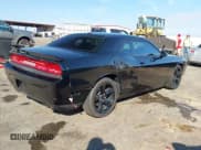 ✅ 2014 Dodge Challenger SXT • VIN: 2C3CDYAG1EH277288 • Lot: 43626237. Listed on IAAI with 104,731 mi. Free auction sales archive from the USA and detailed vehicle history report at DreamBid. Image 4.