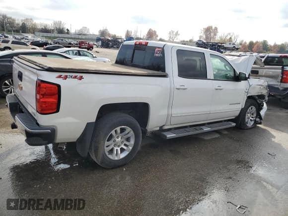 ✅ 2018 Chevrolet Silverado 1500 LT • VIN: 3GCUKREC2JG394844 • Лот: 93418415. Опубликован ранее на Copart с пробегом Не указан. Бесплатный доступ к архиву аукционных продаж из США и подробный отчёт об истории автомобиля на DreamBid. Изображение 3.