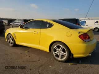 2006 Hyundai Tiburon GT z VIN KMHHN65FX6U202815, wystawiony jako Copart lot #88673255 z przebiegiem Nie podano mil oraz Szkoda całkowita • Salvage title. Historia ofert i sprzedaży dostępna na DreamBid. Obrazek 2.