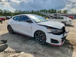 2020 Hyundai Veloster z VIN KMHT36AH7LU004857, wystawiony jako Copart lot #64057205 z przebiegiem 67 220 mil mil oraz Szkoda całkowita • Salvage title. Historia ofert i sprzedaży dostępna na DreamBid. Obrazek 4.