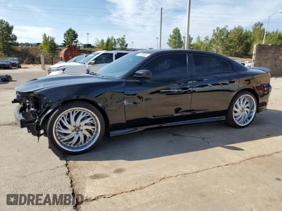 2023 Dodge Charger R/T with VIN 2C3CDXCT8PH685049, listed as a Copart auction lot 81196655 with 15,720 mi miles and Salvage title. Bid and sale history available at DreamBid. Image 1.