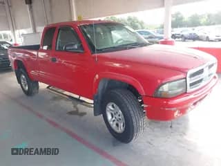 2004 Dodge Dakota SLT с VIN 1D7HG42NX4S734157, выставлен на аукционе IAAI как лот 42608987 с пробегом 148 141 миль миль и . История ставок и продаж доступна на DreamBid. Изображение 1.