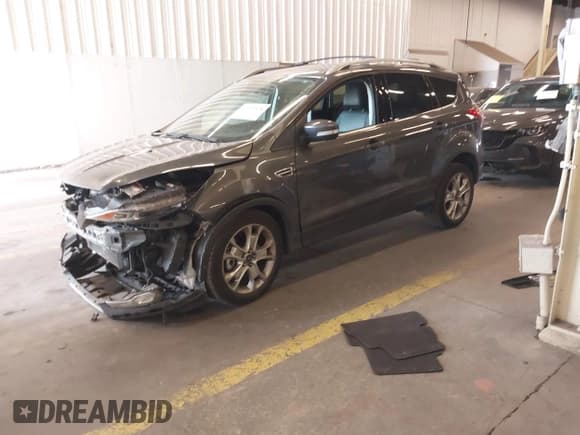 ✅ 2015 Ford Escape Titanium • VIN: 1FMCU9J98FUC05727 • Lot: 42229328. Listed on IAAI with 112,896 mi. Free auction sales archive from the USA and detailed vehicle history report at DreamBid. Image 2.