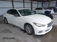 ✅ 2014 Infiniti Q50 Premium • VIN: JN1BV7AP2EM690769 • Lot: 42743093. Listed on IAAI with 134,085 mi. Free auction sales archive from the USA and detailed vehicle history report at DreamBid. Image 1.