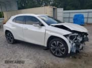 ✅ 2024 Lexus UX 250h Premium • VIN: JTHP6JBH9R2161632 • Lot: 71041865. Listed on Copart with 72,911 mi. Free auction sales archive from the USA and detailed vehicle history report at DreamBid. Image 4.