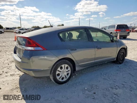 ✅ 2013 Honda Insight LX • VIN: JHMZE2H59DS003833 • Lot: 92709585. Listed on Copart with Not provided. Free auction sales archive from the USA and detailed vehicle history report at DreamBid. Image 3.