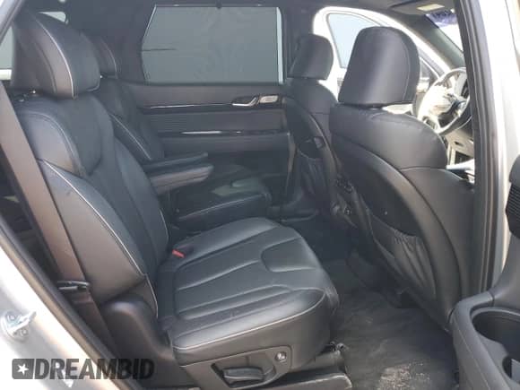 2023 Hyundai Palisade Calligraphy с VIN KM8R74GE4PU597177, выставлен на аукционе Copart как лот 77450264 с пробегом 21 616 миль миль и Списание • Salvage title. История ставок и продаж доступна на DreamBid. Изображение 7.