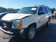 ✅ 2014 GMC Yukon SLT • VIN: 1GKS1CE06ER248616 • Lot: 42498184. Listed on IAAI with 123,186 mi. Free auction sales archive from the USA and detailed vehicle history report at DreamBid. Image 2.