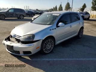 ✅ 2006 Volkswagen Rabbit • VIN: WVWDS71K36W158231 • Лот: 46377275. Опубликован ранее на Copart с пробегом 172 231 миль. Бесплатный доступ к архиву аукционных продаж из США и подробный отчёт об истории автомобиля на DreamBid. Изображение 1.