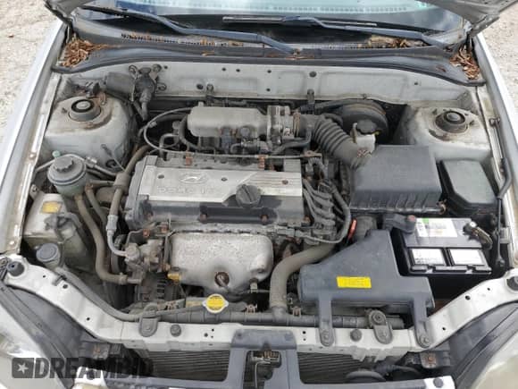 2004 Hyundai Accent GL с VIN KMHCG45C94U515186, выставлен на аукционе Copart как лот 52697284 с пробегом 49 236 миль миль и Списание • Salvage title. История ставок и продаж доступна на DreamBid. Изображение 11.