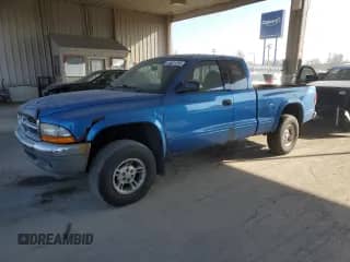 1998 Dodge Dakota SLT z VIN 1B7GG22Y7WS544081, wystawiony jako Copart lot #48621255 z przebiegiem 211 449 mil mil oraz Czysty tytuł • Clean title. Historia ofert i sprzedaży dostępna na DreamBid. Obrazek 1.