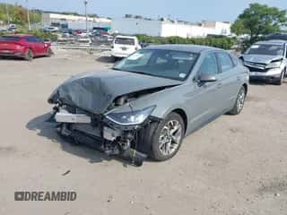 2023 Hyundai Sonata SEL z VIN KMHL64JA8PA280888, wystawiony jako IAAI lot #43255401 z przebiegiem 62 727 mil mil oraz . Historia ofert i sprzedaży dostępna na DreamBid. Obrazek 2.