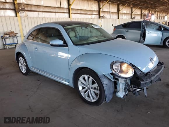✅ 2015 Volkswagen Beetle 2.0L TDI • VIN: 3VWJA7AT2FM621942 • Lot: 91216105. Listed on Copart with 73,480 mi. Free auction sales archive from the USA and detailed vehicle history report at DreamBid. Image 4.