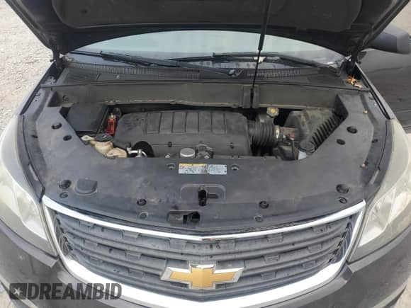 2016 Chevrolet Traverse LS z VIN 1GNKRFED0GJ200370, wystawiony jako Copart lot #86470515 z przebiegiem 156 052 mil mil oraz Czysty tytuł • Clean title. Historia ofert i sprzedaży dostępna na DreamBid. Obrazek 12.