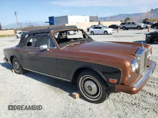 ✅ 1979 Rolls-Royce Flying Spur • VIN: DRK50087 • Lot: 65928224. Wystawiony na Copart z przebiegiem Nie podano. Bezpłatny archiwum sprzedaży aukcyjnych z USA i szczegółowy raport historii pojazdu na DreamBid. Zdjęcie 4.