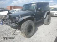 ✅ 2016 Jeep Wrangler Black Bear • VIN: 1C4AJWAG4GL121784 • Lot: 49298755. Wystawiony na Copart z przebiegiem 77 032 mil. Bezpłatny archiwum sprzedaży aukcyjnych z USA i szczegółowy raport historii pojazdu na DreamBid. Zdjęcie 1.