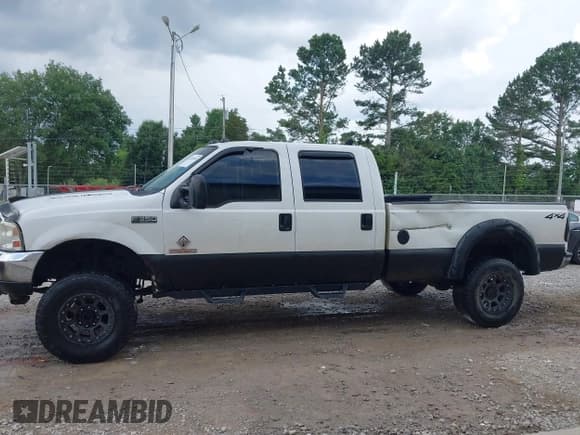 ✅ 2003 Ford F-350 XL • VIN: 1FTSW31P23ED37930 • Lot: 42341869. Listed on IAAI with 313,413 mi. Free auction sales archive from the USA and detailed vehicle history report at DreamBid. Image 14.