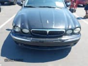✅ 2002 Jaguar X-Type • VIN: SAJEA51D22XC27528 • Lot: 43153213. Listed on IAAI with Not provided. Free auction sales archive from the USA and detailed vehicle history report at DreamBid. Image 11.