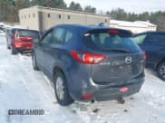 ✅ 2014 Mazda CX-5 Sport • VIN: JM3KE2BEXE0398881 • Lot: 43848471. Listed on IAAI with 173,392 mi. Free auction sales archive from the USA and detailed vehicle history report at DreamBid. Image 3.