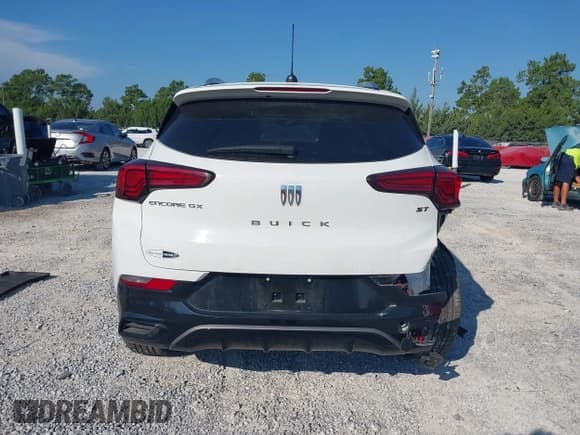 ✅ 2024 Buick Encore GX Sport Touring • VIN: KL4AMDSL8RB030477 • Lot: 43027241. Listed on IAAI with 30,139 mi. Free auction sales archive from the USA and detailed vehicle history report at DreamBid. Image 16.