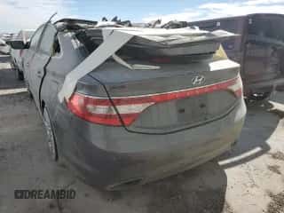 2013 Hyundai Azera z VIN KMHFH4JG5DA322473, wystawiony jako Copart lot #67182934 z przebiegiem Nie podano mil oraz Nie do naprawy • Non repairable. Historia ofert i sprzedaży dostępna na DreamBid. Obrazek 6.