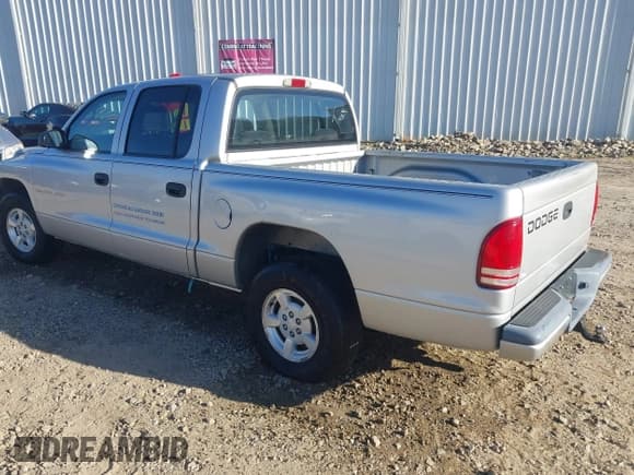 ✅ 2002 Dodge Dakota Sport • VIN: 1B7HL38N02S681523 • Lot: 43537584. Wystawiony na IAAI z przebiegiem 216 042 mil. Bezpłatny archiwum sprzedaży aukcyjnych z USA i szczegółowy raport historii pojazdu na DreamBid. Zdjęcie 3.