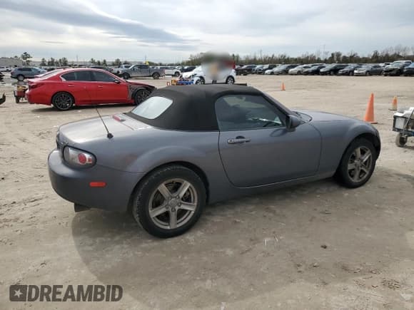 ✅ 2007 Mazda MX-5 Miata Sport • VIN: JM1NC25F170133320 • Лот: 88883175. Опубликован ранее на Copart с пробегом 140 411 миль. Бесплатный доступ к архиву аукционных продаж из США и подробный отчёт об истории автомобиля на DreamBid. Изображение 3.
