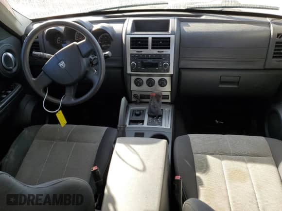 2007 Dodge Nitro SXT с VIN 1D8GU28KX7W664917, выставлен на аукционе Copart как лот 75535664 с пробегом 167 462 миль миль и Списание • Salvage title. История ставок и продаж доступна на DreamBid. Изображение 8.