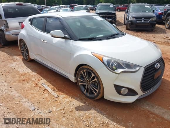 ✅ 2016 Hyundai Veloster Turbo • VIN: KMHTC6AE0GU293981 • Lot: 42354864. Wystawiony na IAAI z przebiegiem 118 691 mil. Bezpłatny archiwum sprzedaży aukcyjnych z USA i szczegółowy raport historii pojazdu na DreamBid. Zdjęcie 1.