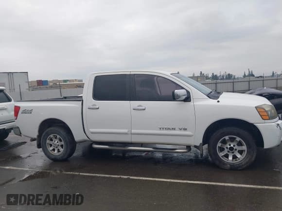 ✅ 2005 Nissan Titan SE • VIN: 1N6AA07B15N521468 • Lot: 43758534. Listed on IAAI with Not provided. Free auction sales archive from the USA and detailed vehicle history report at DreamBid. Image 13.