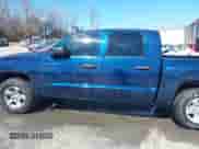 2006 Dodge Dakota SLT with VIN 1D7HE48N76S702816, listed as a IAAI auction lot 41685793 with 192,271 mi miles and . Bid and sale history available at DreamBid. Image 14.