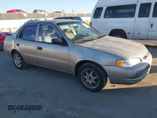 ✅ 2000 Toyota Corolla VE • VIN: 1NXBR12E5YZ302851 • Lot: 43875763. Listed on IAAI with 228,156 mi. Free auction sales archive from the USA and detailed vehicle history report at DreamBid. Image 1.