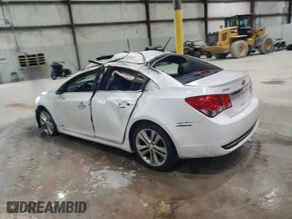 ✅ 2014 Chevrolet Cruze LTZ • VIN: 1G1PG5SB5E7203818 • Lot: 83825085. Listed on Copart with 94,394 mi. Free auction sales archive from the USA and detailed vehicle history report at DreamBid. Image 2.
