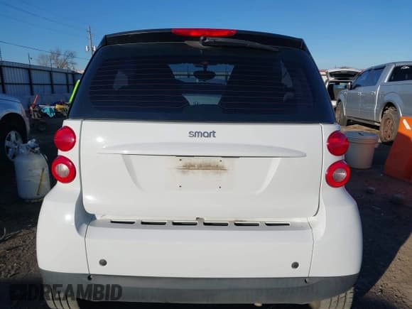 ✅ 2009 Smart fortwo Pure • VIN: WMEEJ31X99K292492 • Lot: 41029051. Listed on IAAI with 57,741 mi. Free auction sales archive from the USA and detailed vehicle history report at DreamBid. Image 16.