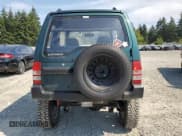 ✅ 1995 Mitsubishi Montero • VIN: H56A5005215 • Лот: 70391775. Опубликован ранее на Copart с пробегом 81 576 миль. Бесплатный доступ к архиву аукционных продаж из США и подробный отчёт об истории автомобиля на DreamBid. Изображение 6.